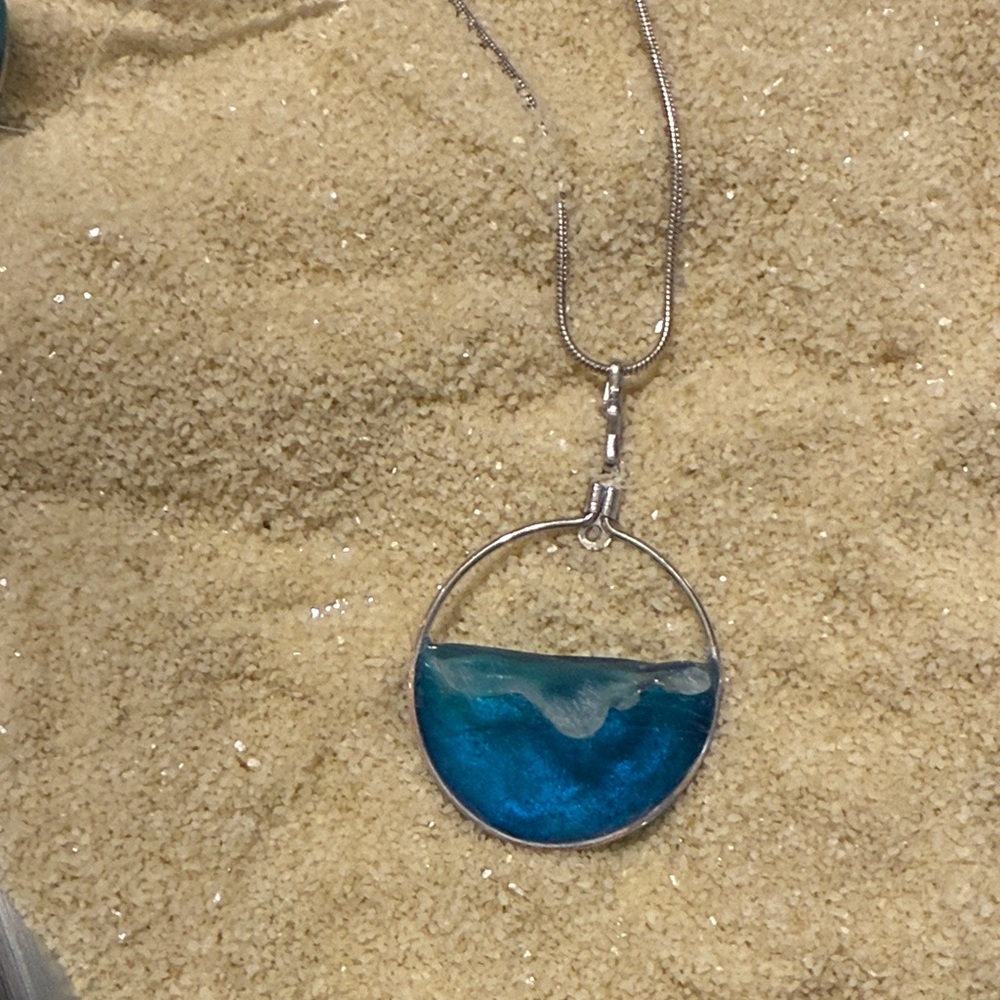 Elegant Silver and Blue Wave Pendant Necklace